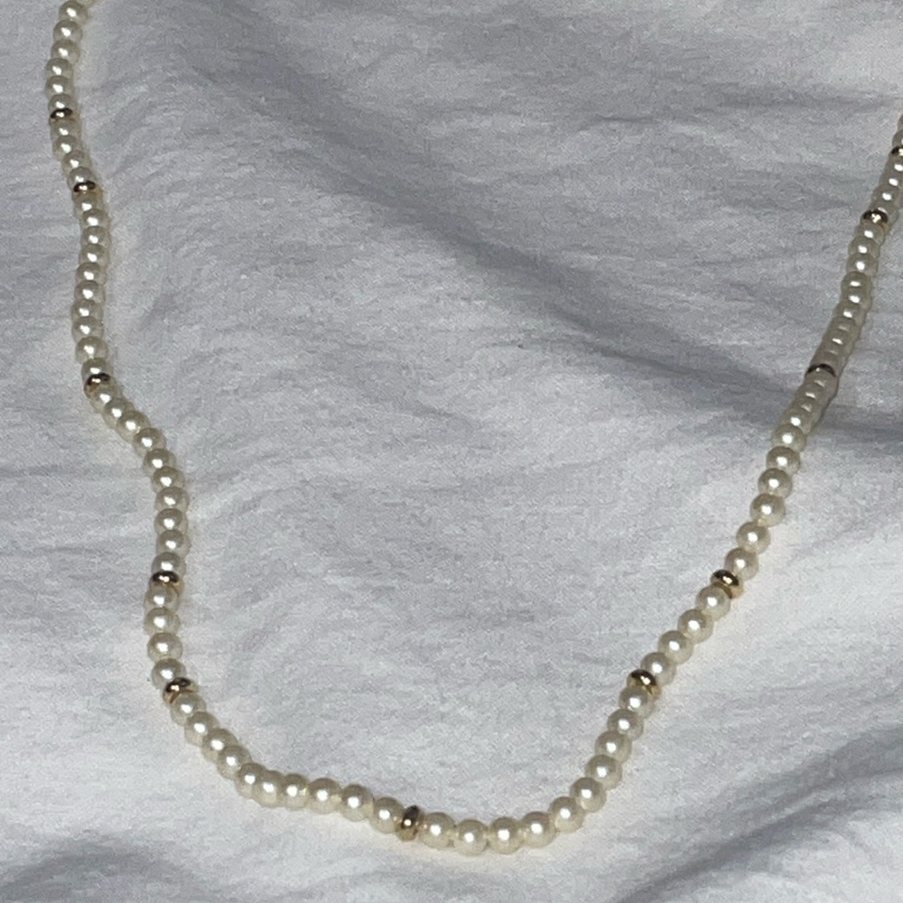 MONET Vintage gold tone bright white tiny pearl repeating necklace signed slide